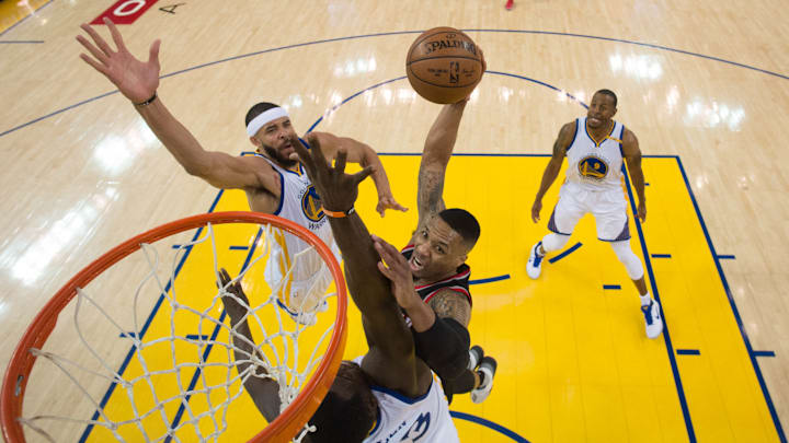 April 16, 2017; Oakland, CA, USA; Portland Trail Blazers guard Damian Lillard (0) drives to the basket during the first half in game one of the first round of the 2017 NBA Playoffs against the Golden State Warriors at Oracle Arena. The Warriors defeated the Trail Blazers 121-109. Mandatory Credit: Kyle Terada-USA TODAY Sports