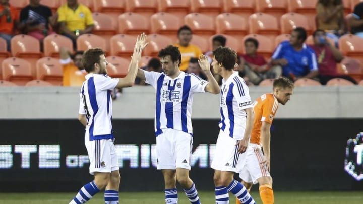 May 24, 2016; Houston, TX, USA; Real Sociedad midfielder Ruben Pardo (14) celebrates with teammates after scoring a goal during the second half against the Houston Dynamo at Compass Stadium. The Dynamo won 4-3. Mandatory Credit: Troy Taormina-USA TODAY Sports