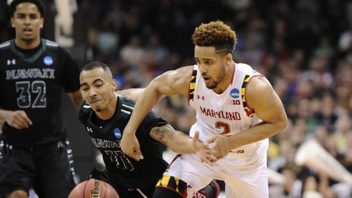 March 20, 2016; Spokane , WA, USA; Hawaii Rainbow Warriors guard Quincy Smith (11) plays for the ball against Maryland Terrapins guard Melo Trimble (2) during the second half in the second round of the 2016 NCAA Tournament at Spokane Veterans Memorial Arena. Mandatory Credit: James Snook-USA TODAY Sports