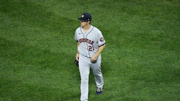 Oct 19, 2021; Boston, Massachusetts, USA; Houston Astros starting pitcher Zack Greinke (21) walks off of the field during the second inning of game four of the 2021 ALCS at Fenway Park. Mandatory Credit: Bob DeChiara-USA TODAY Sports