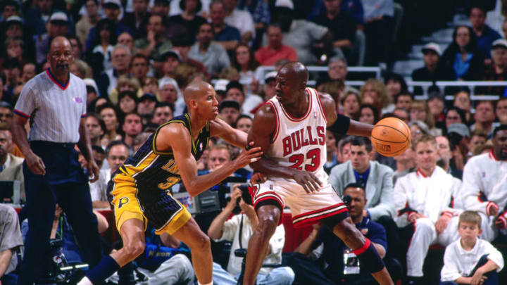 CHICAGO - MAY 31: Reggie Miller #31 of the Indiana Pacers defends Michael Jordan #23 of the Chicago Bullsduring a game played on May 31, 1998 at the United Center in Chicago, Illinois. NOTE TO USER: User expressly acknowledges and agrees that, by downloading and or using this photograph, User is consenting to the terms and conditions of the Getty Images License Agreement. Mandatory Copyright Notice: Copyright 1998 NBAE (Photo by Nathaniel S. Butler/NBAE via Getty Images)