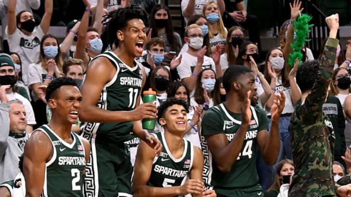 Nov 12, 2021; East Lansing, Michigan, USA; Michigan StateÕs bench erupts on a shot in the second half players are Tyson Walker(2), AJ Hoggard(11) Max Christie(5) and Gave Brown(44) at Jack Breslin Student Events Center. Mandatory Credit: Dale Young-USA TODAY Sports
