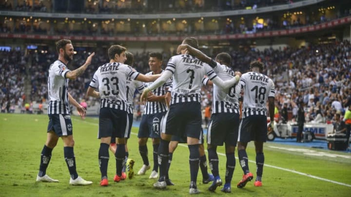 MONTERREY, MEXICO - APRIL 14: Rogelio Funes Mori of Monterrey celebrates with teammates after scoring his team’s third goal during the 14th round match between Monterrey and Santos as part of the Torneo Clausura 2019 Liga MX at BBVA Bancomer Stadium on April 14, 2019 in Monterrey, Mexico. (Photo by Azael Rodriguez/Getty Images)