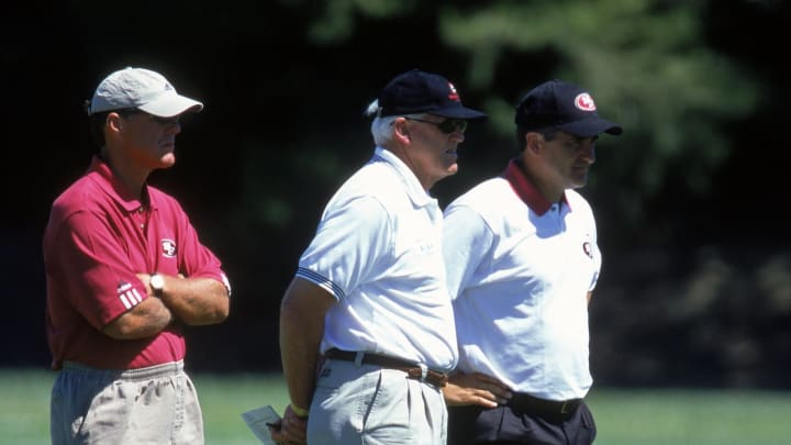 19 Jul 2000: Head Coach Steve Mariucci of the San Francisco 49ers is looking on with Terry Donahue and Bill Walsh in during the 49ers Training Camp at the University of the Pacific in Stockton, California.Mandatory Credit: Tom Hauck /Allsport