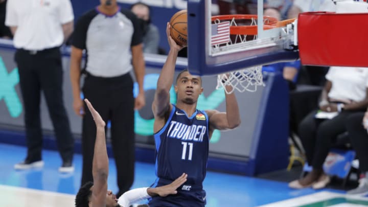 May 14, 2021; Oklahoma City, Oklahoma, USA; Oklahoma City Thunder guard Theo Maledon (11) shoots over Utah Jazz guard Miye Oni (81) during the third quarter at Chesapeake Energy Arena. Mandatory Credit: Alonzo Adams-USA TODAY Sports