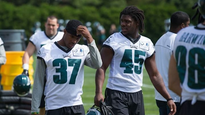May 24, 2016; Philadelphia, PA, USA; Philadelphia Eagles cornerback C.J. Smith (37) and linebacker Myke Tavarres (45) during OTS