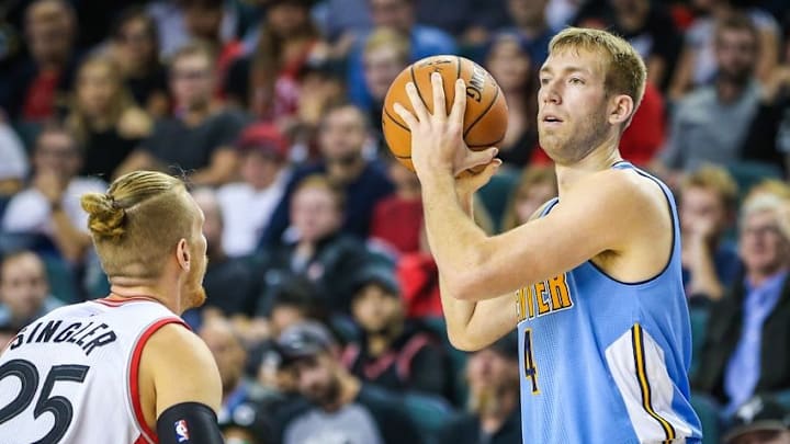 Oct 3, 2016; Calgary, Alberta, CAN; Denver Nuggets forward Robbie Hummel (4) controls the ball against the Toronto Raptors during the fourth quarter at Scotiabank Saddledome. Denver won 108-106. Mandatory Credit: Sergei Belski-USA TODAY Sports Oct 3, 2016; Calgary, Alberta, CAN; Denver Nuggets forward Robbie Hummel (4) controls the ball against the Toronto Raptors during the fourth quarter at Scotiabank Saddledome. Denver won 108-106. Mandatory Credit: Sergei Belski-USA TODAY Sports