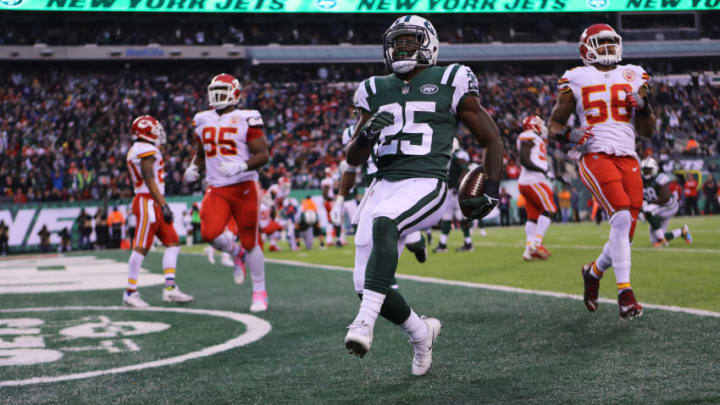 EAST RUTHERFORD, NJ - DECEMBER 03: Elijah McGuire of the New York Jets reacts after scoring a touchdown in the fourth quarter during their game at MetLife Stadium on December 3, 2017 in East Rutherford, New Jersey. (Photo by Abbie Parr/Getty Images)