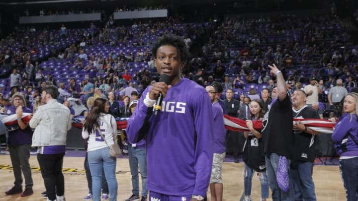 SACRAMENTO, CA - OCTOBER 25: De'Aaron Fox #5 of the Sacramento Kings addresses fans prior to the game against the Portland Trail Blazers on October 25, 2019 at Golden 1 Center in Sacramento, California. NOTE TO USER: User expressly acknowledges and agrees that, by downloading and or using this photograph, User is consenting to the terms and conditions of the Getty Images Agreement. Mandatory Copyright Notice: Copyright 2019 NBAE (Photo by Rocky Widner/NBAE via Getty Images)
