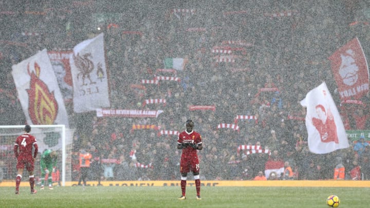 LIVERPOOL, ENGLAND - MARCH 17: Sadio Mane of Liverpool says a prayer ahead of kick off during the Premier League match between Liverpool and Watford at Anfield on March 17, 2018 in Liverpool, England. (Photo by Jan Kruger/Getty Images)