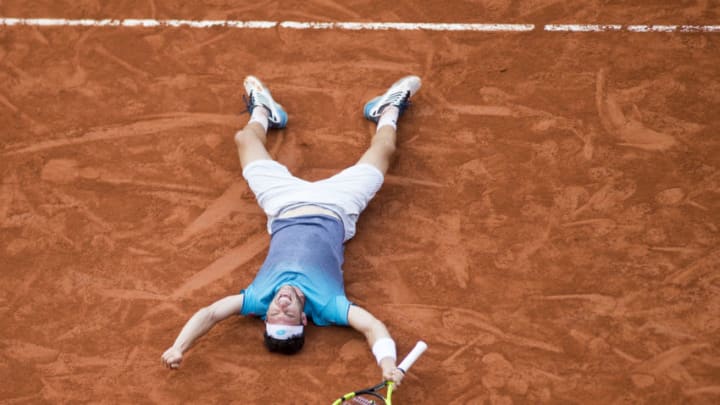 PARIS, FRANCE June 5. French Open Tennis Tournament - Day Ten.   Marco Cecchinato of Italy celebrate his victory against Novak Djokovic of Serbia on Court Suzanne Lenglen in the Men's Singles Quarter Finals at the 2018 French Open Tennis Tournament at Roland Garros on June 5th 2018 in Paris, France. (Photo by Tim Clayton/Corbis via Getty Images)