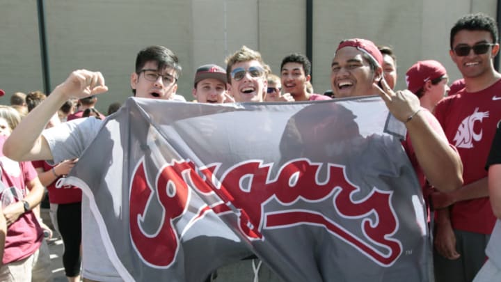 PULLMAN, WASHINGTON - SEPTEMBER 07: Washington State Cougars fans celebrate prior to the game against the Northern Colorado Bears at Martin Stadium on September 07, 2019 in Pullman, Washington. (Photo by William Mancebo/Getty Images)