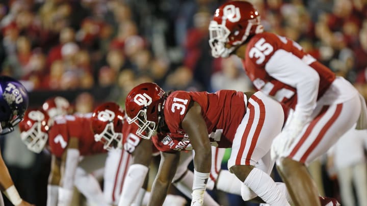 NORMAN, OK – NOVEMBER 23: Defensive lineman Jalen Redmond #31 of the Oklahoma Sooners prepares for a snap by the TCU Horned Frogs in the first quarter on November 23, 2019 at Gaylord Family Oklahoma Memorial Stadium in Norman, Oklahoma. OU held on to win 28-24. (Photo by Brian Bahr/Getty Images)