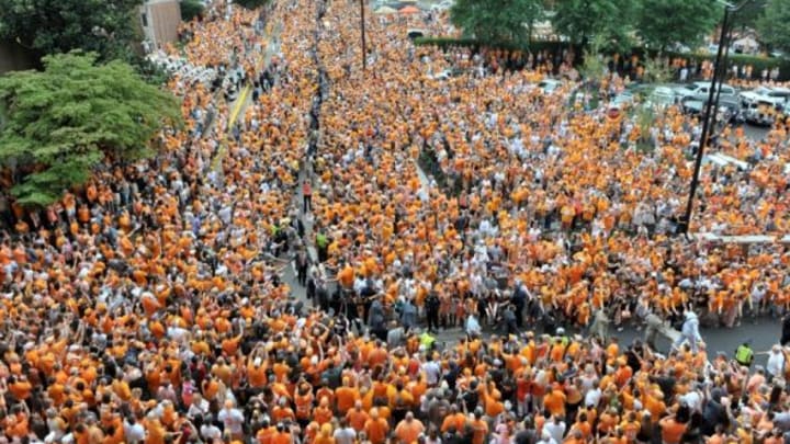 Aug 31, 2014; Knoxville, TN, USA; Tennessee Volunteers fans gather to welcome their team during Vol Walk prior to the game against the Utah State Aggies at Neyland Stadium. Mandatory Credit: Jim Brown-USA TODAY Sports