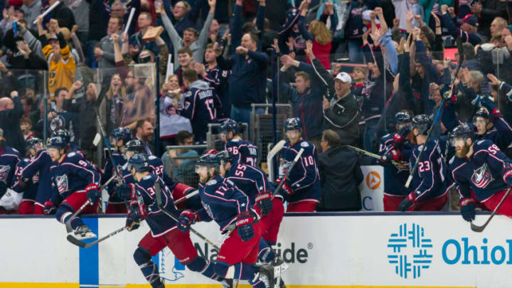 COLUMBUS, OH - APRIL 03: Columbus Blue Jackets center Brandon Dubinsky (17) and teammates clear the bench after the winning goal was scored in overtime of a game between the Columbus Blue Jackets and the Detroit Red Wings on April 03, 2018 at Nationwide Arena in Columbus, OH.(Photo by Adam Lacy/Icon Sportswire via Getty Images)