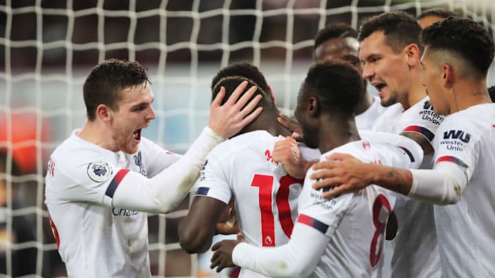 BIRMINGHAM, ENGLAND - NOVEMBER 02: Sadio Mane of Liverpool celebrates with Andy Robertson and teammates after scoring his team's second goal during the Premier League match between Aston Villa and Liverpool FC at Villa Park on November 02, 2019 in Birmingham, United Kingdom. (Photo by Marc Atkins/Getty Images)