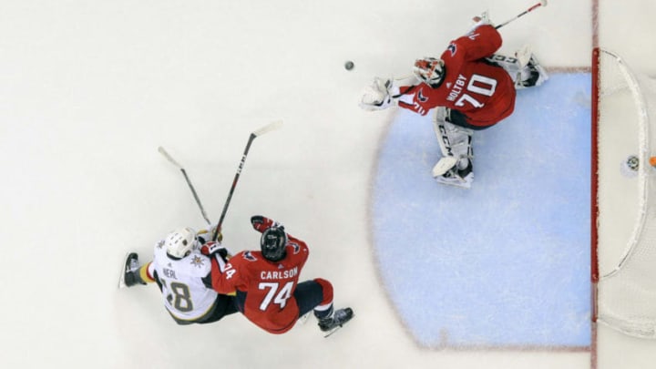 WASHINGTON, DC - JUNE 02: Washington Capitals goaltender Braden Holtby (70) makes a third period save on shot by Vegas Golden Knights left wing James Neal (18) on June 2, 2018, at the Capital One Arena in Washington, D.C. in Game 3 of the Stanley Cup Playoffs. The Washington Capitals defeated the Vegas Golden Knights, 3-1. (Photo by Mark Goldman/Icon Sportswire via Getty Images)