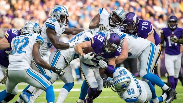 Nov 6, 2016; Minneapolis, MN, USA; Minnesota Vikings wide receiver Adam Thielen (19) is tackled by the Detroit Lions defense during the third quarter at U.S. Bank Stadium. The Lions defeated the Vikings 22-16. Mandatory Credit: Brace Hemmelgarn-USA TODAY Sports