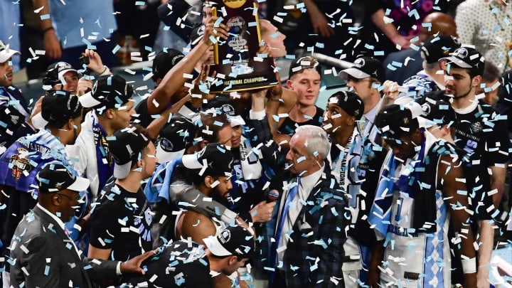 Apr 3, 2017; Phoenix, AZ, USA; North Carolina Tar Heels team holds up the trophy after the win over the Gonzaga Bulldogs in the championship game of the 2017 NCAA Men’s Final Four at University of Phoenix Stadium. North Carolina defeated Gonzaga 71-65. Mandatory Credit: Joe Camporeale-USA TODAY Sports