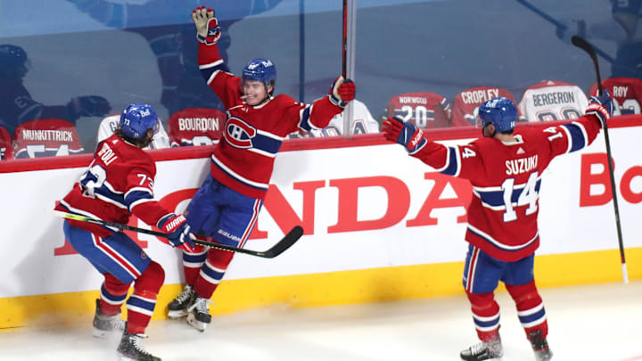 Montreal Canadiens right wing Cole Caufield (22) celebrates his goal against Vegas Golden Knights with teammates right wing Tyler Toffoli (73) and center Nick Suzuki (14) Mandatory Credit: Jean-Yves Ahern-USA TODAY Sports