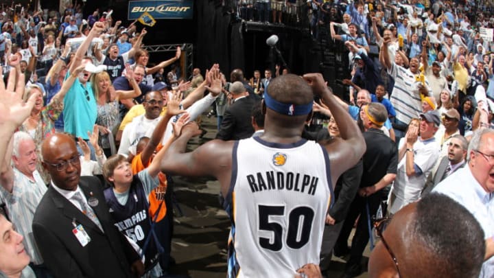 MEMPHIS, TN - APRIL 23: Zach Randolph #50 of the Memphis Grizzlies hi-fives the fans after defeating the San Antonio Spurs in Game Three of the Western Conference Quarterfinals in the 2011 NBA Playoffs on April 23, 2011 at FedExForum in Memphis, Tennessee. NOTE TO USER: User expressly acknowledges and agrees that, by downloading and or using this photograph, User is consenting to the terms and conditions of the Getty Images License Agreement. Mandatory Copyright Notice: Copyright 2011 NBAE (Photo by Joe Murphy/NBAE via Getty Images)