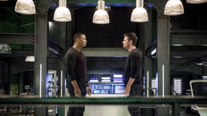 Arrow -- "Brothers in Arms" -- Image Number: AR617a_0072.jpg -- Pictured (L-R): David Ramsey as John Diggle/Spartan and Stephen Amell as Oliver Queen/Green Arrow -- Photo: Jack Rowand/The CW -- ÃÂ© 2018 The CW Network, LLC. All rights reserved.