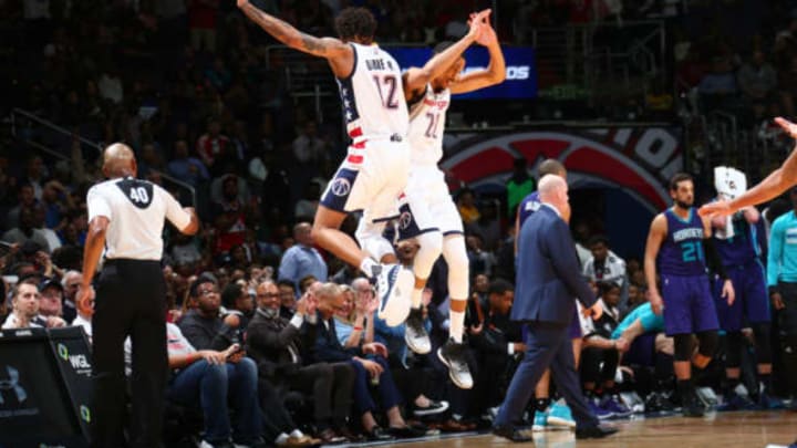 WASHINGTON, DC –  APRIL 4: Kelly Oubre Jr. #12 and Otto Porter Jr. #22 of the Washington Wizards celebrate a game clinching shot against the Charlotte Hornets on April 4, 2017 at Verizon Center in Washington, DC. Copyright 2017 NBAE (Photo by Ned Dishman/NBAE via Getty Images)