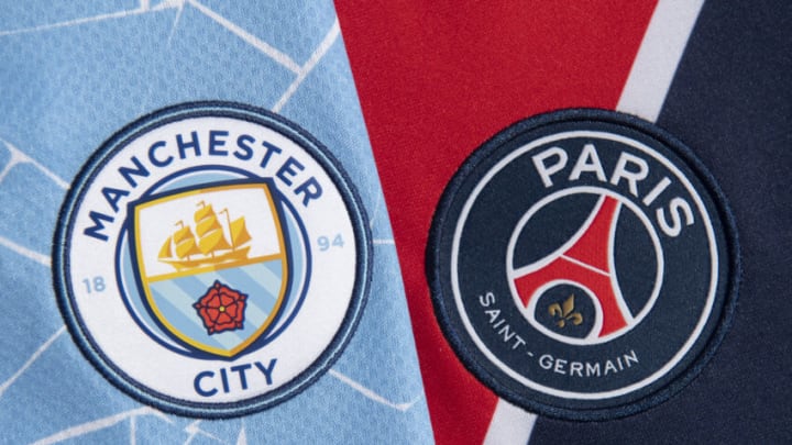 MANCHESTER, ENGLAND - MARCH 30: The Manchester City and Paris Saint-Germain club badges on their first team home shirts on March 30, 2021 in Manchester, United Kingdom. (Photo by Visionhaus/Getty Images)