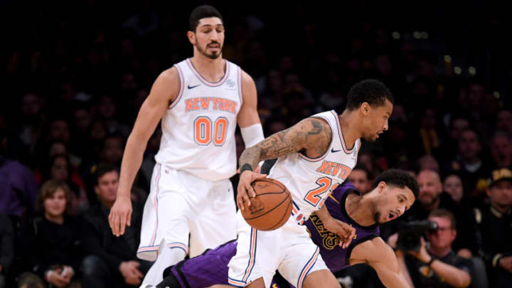 LOS ANGELES, CALIFORNIA - JANUARY 04: Trey Burke #23 of the New York Knicks drives on a falling Josh Hart #3 of the Los Angeles Lakers, as Enes Kanter #00 looks on, during a 119-112 Knicks win at Staples Center on January 04, 2019 in Los Angeles, California. NOTE TO USER: User expressly acknowledges and agrees that, by downloading and or using this photograph, User is consenting to the terms and conditions of the Getty Images License Agreement. (Photo by Harry How/Getty Images)
