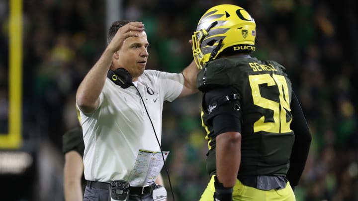 EUGENE, OREGON – OCTOBER 05: Head Coach Mario Cristobal has a moment with Penei Sewell #58 of the Oregon Ducks in the fourth quarter against the California Golden Bears during their game at Autzen Stadium on October 05, 2019 in Eugene, Oregon. (Photo by Abbie Parr/Getty Images)