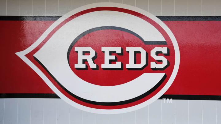 GOODYEAR, AZ – MARCH 08: A Cincinnati Reds logo is seen in the dugout during the spring training game between the Cincinnati Reds and the Los Angeles Angels at Goodyear Ballpark on March 8, 2017 in Goodyear, Arizona. (Photo by Tim Warner/Getty Images)