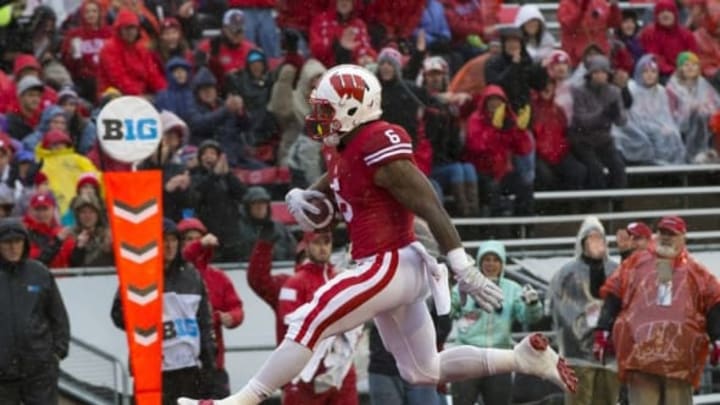 Oct 31, 2015; Madison, WI, USA; Wisconsin Badgers running back Corey Clement (6) rushes for a touchdown during the first quarter against the Rutgers Scarlet Knights at Camp Randall Stadium. Mandatory Credit: Jeff Hanisch-USA TODAY Sports