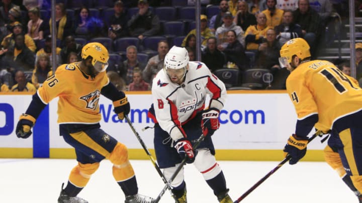 NASHVILLE, TN - JANUARY 15: Washington Capitals left wing Alex Ovechkin (8) loses control of the puck as Nashville Predators defenseman P.K. Subban (76) and defenseman Mattias Ekholm (14) defend during the NHL game between the Nashville Predators and Washington Capitals, held on January 15, 2019, at Bridgestone Arena in Nashville, Tennessee. (Photo by Danny Murphy/Icon Sportswire via Getty Images)