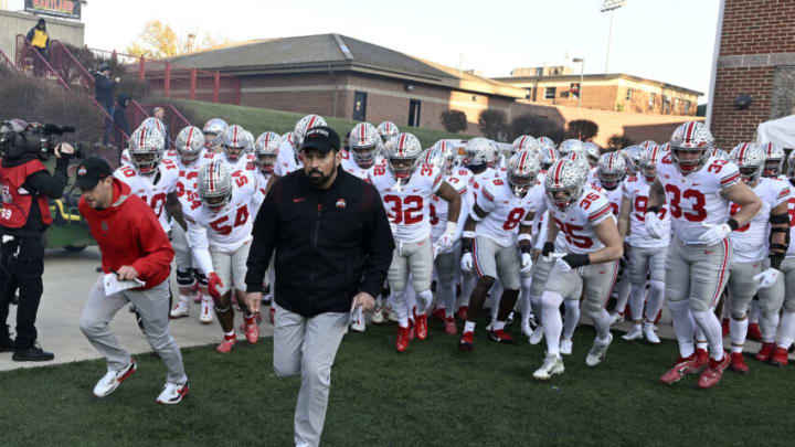 COLLEGE PARK, MARYLAND - NOVEMBER 19: Head coach Ryan Day of the Ohio State Buckeyes leads his team onto the field before the game against the Maryland Terrapins at SECU Stadium on November 19, 2022 in College Park, Maryland. (Photo by G Fiume/Getty Images)