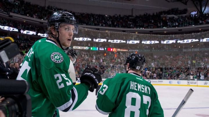 Mar 21, 2015; Dallas, TX, USA; Dallas Stars right wing Brett Ritchie (25) and right wing Ales Hemsky (83) celebrate a goal against the Chicago Blackhawks during the game at the American Airlines Center. The Stars shut out the Blackhawks 4-0. Mandatory Credit: Jerome Miron-USA TODAY Sports
