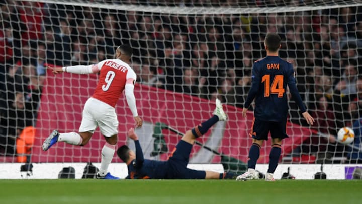 LONDON, ENGLAND - MAY 02: Alexandre Lacazette of Arsenal (9) scores his team's first goal during the UEFA Europa League Semi Final First Leg match between Arsenal and Valencia at Emirates Stadium on May 02, 2019 in London, England. (Photo by Shaun Botterill/Getty Images)