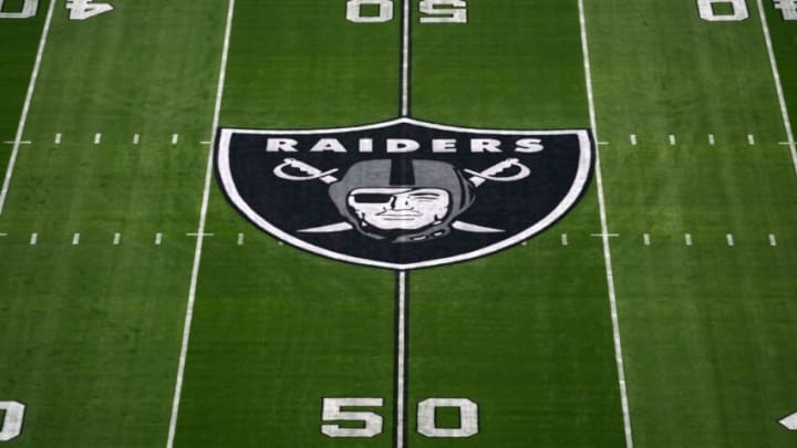 Nov 14, 2021; Paradise, Nevada, USA; A detailed view of the Las Vegas Raiders shield logo at midfield at Allegiant Stadium. Mandatory Credit: Kirby Lee-USA TODAY Sports