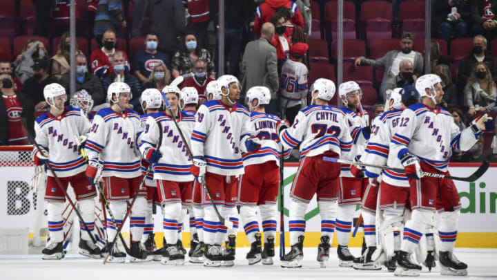 MONTREAL, QC - OCTOBER 16: The New York Rangers celebrate their victory against the Montreal Canadiens at Centre Bell on October 16, 2021 in Montreal, Canada. The New York Rangers defeated the Montreal Canadiens 3-1. (Photo by Minas Panagiotakis/Getty Images)