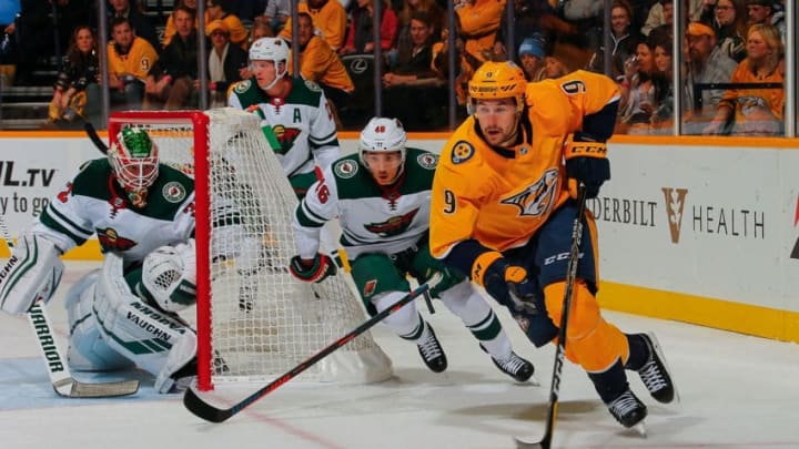 NASHVILLE, TN - OCTOBER 15: Filip Forsberg #9 of the Nashville Predators carries the puck past Jared Spurgeon #46 and goalie Alex Stalock #32 of the Minnesota Wild during the first period at at Bridgestone Arena on October 15, 2018 in Nashville, Tennessee. (Photo by Frederick Breedon/Getty Images)