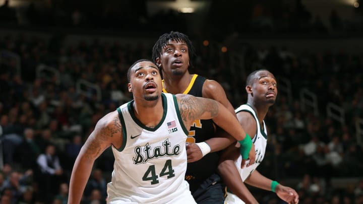 EAST LANSING, MI – DECEMBER 03: Nick Ward #44 of the Michigan State Spartans box out Tyler Cook #25 of the Iowa Hawkeyes during a free throw attempt during in the second half at Breslin Center on December 3, 2018 in East Lansing, Michigan. (Photo by Rey Del Rio/Getty Images)