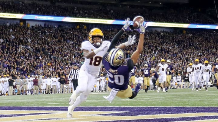 SEATTLE, WA - SEPTEMBER 22: Ty Jones #20 of the Washington Huskies completes a 19 yard touchdown against Langston Frederick #18 of the Arizona State Sun Devils in the first quarter during their game at Husky Stadium on September 22, 2018 in Seattle, Washington. (Photo by Abbie Parr/Getty Images)