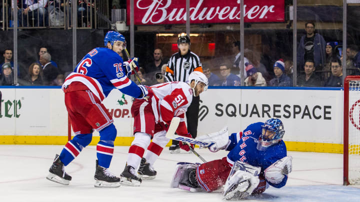 NEW YORK, NY – NOVEMBER 24: New York Rangers Goalie Henrik Lundqvist (30) reaches out to glove the puck during the third period of a regular season NHL game between the Detroit Red Wings and the New York Rangers on November 24, 2017, at Madison Square Garden in New York, NY. (Photo by David Hahn/Icon Sportswire via Getty Images)