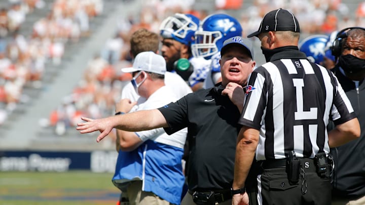 Sep 26, 2020; Auburn, Alabama, USA; Kentucky Wildcats head coach Mark Stoops questions an official during the second quarter against the Auburn Tigers at Jordan-Hare Stadium. Mandatory Credit: John Reed-USA TODAY Sports