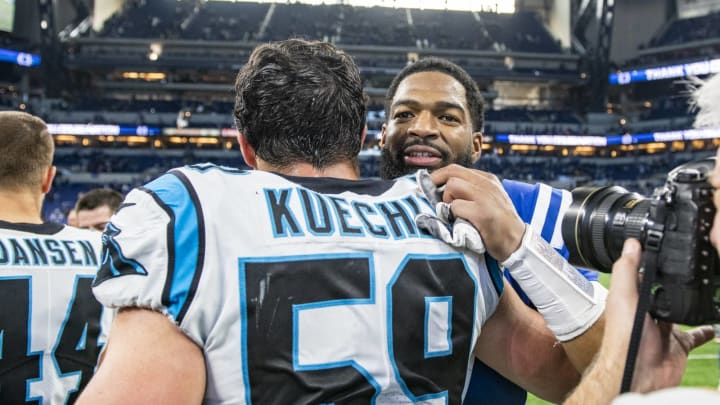INDIANAPOLIS, IN – DECEMBER 22: Jacoby Brissett #7 of the Indianapolis Colts and Luke Kuechly #59 of the Carolina Panthers meet after the game between the Indianapolis Colts and the Carolina Panthers at Lucas Oil Stadium on December 22, 2019 in Indianapolis, Indiana. (Photo by Bobby Ellis/Getty Images)