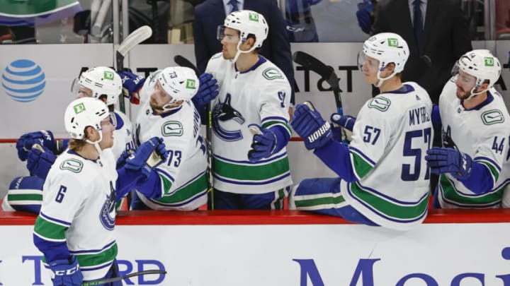 Oct 21, 2021; Chicago, Illinois, USA; Vancouver Canucks right wing Brock Boeser (6) celebrates with teammates after scoring against the Chicago Blackhawks during the second period at United Center. Mandatory Credit: Kamil Krzaczynski-USA TODAY Sports