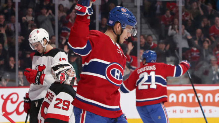 Montreal Canadiens center Jesperi Kotkaniemi (15) celebrates a right wing Joel Armia (not pictured) goal against New Jersey Devils goaltender Mackenzie Blackwood (29) during the second period at Bell Centre. Mandatory Credit: Jean-Yves Ahern-USA TODAY Sports
