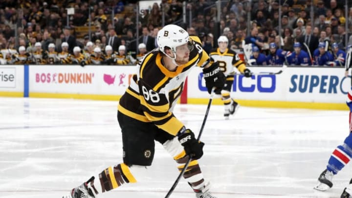 BOSTON, MA - MARCH 27: Boston Bruins right wing David Pastrnak (88) shoots during a game between the Boston Bruins and the New York Rangers on March 27, 2019, at TD Garden in Boston, Massachusetts. (Photo by Fred Kfoury III/Icon Sportswire via Getty Images)