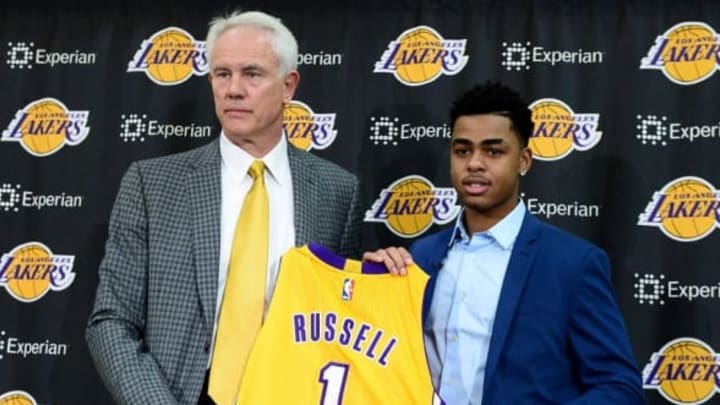 Jun 29, 2015; Los Angeles, CA, USA; Los Angeles Lakers guard D’Angelo Russell (1) is introduced to the media by general manager Mitch Kupchak during a press conference at the Toyota Sports Center. Mandatory Credit: Jayne Kamin-Oncea-USA TODAY Sports
