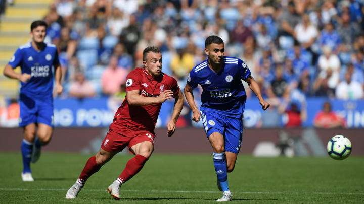 LEICESTER, ENGLAND – SEPTEMBER 01: Xherdan Shaqiri of Liverpool and Rachid Ghezzal of Leicester City battle for the ball during the Premier League match between Leicester City and Liverpool FC at The King Power Stadium on September 1, 2018 in Leicester, United Kingdom. (Photo by Shaun Botterill/Getty Images)