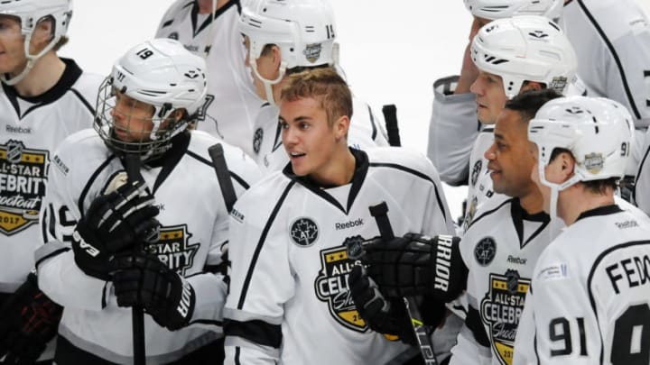 LOS ANGELES, CA - JANUARY 28: Entertainer Justin Bieber (6) on the ice with his celebrity teammates after a Celebrity Shootout hockey game played before the All-Star Skills Competition held on January 28, 2017 at the Staples Center in Los Angeles, CA. (Photo by John Cordes/Icon Sportswire via Getty Images)